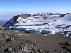 Furtw�ngler Glacier atop Kilimanjaro in the foreground and snowfields and the Northern Icefields beyond.