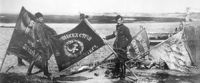 Polish soldiers displaying captured Soviet battle flags after the Battle of Warsaw.