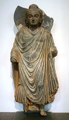 Standing Buddha sculpture, ancient region of Gandhara, northern Pakistan, 1st century CE, Mus�e Guimet, Paris.