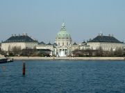 Amalienborg Palace - home of the Danish royal family. The central building is the domed Marble Church located behind the palace complex