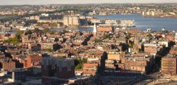 Image of the North End, Boston neighborhood. The Old North Church is at center, a Big Dig vent building is near the bottom, and the green Tobin Bridge over the Mystic River is at the top.