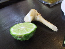 Citrus hystrix fruit (left), used in Southeast asian cooking, with galangal root.