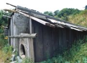 Reconstruction of a Yurok Native American plankhouse constructed of redwood boards.