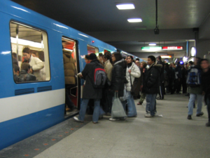 A train at Berri-UQAM during rush hour