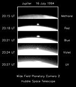 HST images of a fireball from the first impact appearing over the limb of the planet.