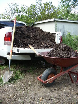 Moving soil.