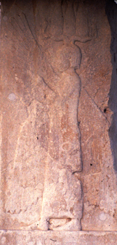 A bas-relief found at Pasargadae shows a winged-figure thought to be Cyrus, depicted with four Assyrian wings, and wearing an Egyptian hemhem crown, and a Persian dress.