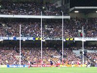 The two tall central posts are the goal posts, and the two shorter outer posts are the behind posts.