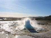 Strokkur, a geyser in the process of erupting. Lying on the Mid-Atlantic Ridge, Iceland is one of the most geologically active areas on Earth.