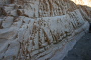 Metamorphic rock foliated in two perpendicular directions, found in Mosaic Canyon of Death Valley National Park