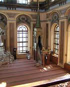 The prayer hall, or musalla, in a Turkish mosque, with a Minibar.