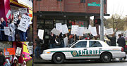 Children protest the reclassification of Pluto, police keep counter-protesters on a different corner.