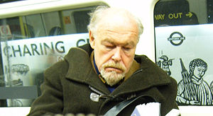 Timothy West on London Underground train.