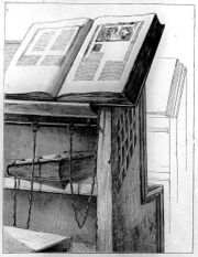 Desk with chained books in the Library of Cesena, Italy.