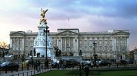 The Beatles received their MBEs at Buckingham Palace.