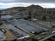 Waverley (viewed from the Scott Monument), is located in the ravine between the Old and New Town on the drained Nor Loch.