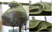 Greek helmet with swastika marks on the top part (details), 350-325 BC from Taranto, found at Herculanum. Cabinet des Médailles, Paris.