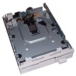 The 3�-inch floppy disk drive automatically engages when the user inserts a disk, and disengages and ejects with the press of the eject button. On Macintoshes with built-in floppy drives, the disk is ejected by a motor (similar to a VCR) instead of manually; there is no eject button. The disk's desktop icon is dragged onto the Trash icon to eject a disk.