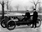 Ford (standing) launched Barney Oldfield's career in 1902