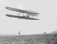 Wilbur flying almost four circles of Huffman Prairie, about 2 and 3/4 miles in 5 minutes 4 seconds; flight #82, November 9, 1904.