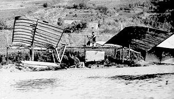 Glenn Curtiss or an assistant coaxes the structurally modified Langley Aerodrome into the air above the surface of Keuka Lake near Hammondsport, N.Y., September 17, 1914.