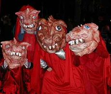 Ubu Apocalypse, a presentation of over-sized papier-m�ch� masks at the Village Halloween Parade in New York City.