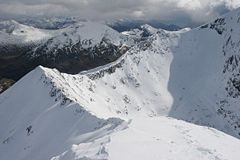 The CMD Ar�te under deep snow in spring, from the summit of Carn M�r Dearg.