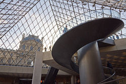 View of the outside from inside the Louvre Pyramid