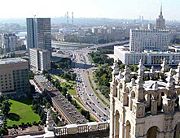 View from the Stalin skyscraper in Kudrinskaya Square. The mayor's highrise office (the former Comecon headquarters) is to the left, the Russian government building to the right