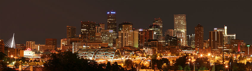 The skyline of downtown Denver with Speer Boulevard in the foreground, facing east.