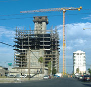 Newport Lofts high-rise development under construction with newly finished Soho Lofts in the background.