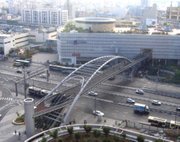 Multimodal traffic in Tel Aviv includes pedestrians, private cars, buses, trucks, taxis and trains.