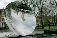 Nottingham Playhouse and Cathedral reflected in Anish Kapoor's Sky Mirror