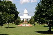 The Viharamahadevi Park, shown with its famous Buddha statue and fountains and with the Colombo town hall in view, is an example of the abundance of greenery in Colombo