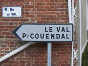 A streetsign in Merck-Saint-Li�vin, Pas-de-Calais, showing Germanic influence in local toponyms. The name Picquendal corresponds to the modern Dutch Pikkendal.