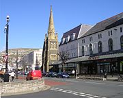 Mostyn Street stores and St. John's Methodist Church