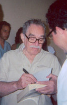 The Colombian Garc�a M�rquez signing a copy of One Hundred Years of Solitude in Havana, Cuba.