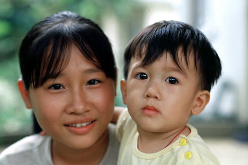 Girl and her brother in Go-Vap