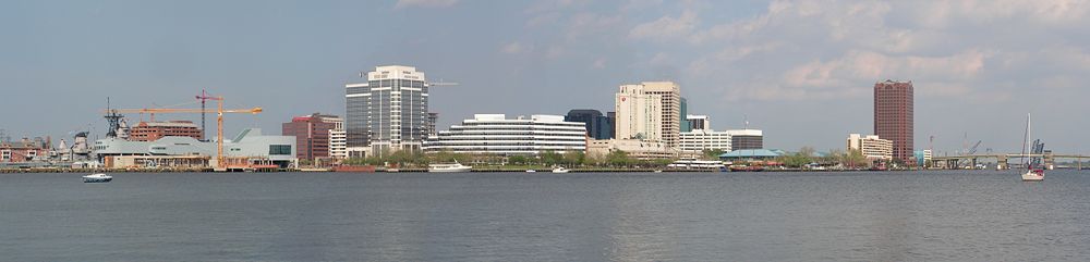 Norfolk skyline as seen from Portsmouth, stretching from USS Wisconsin (BB-64) to the Berkley Bridge.