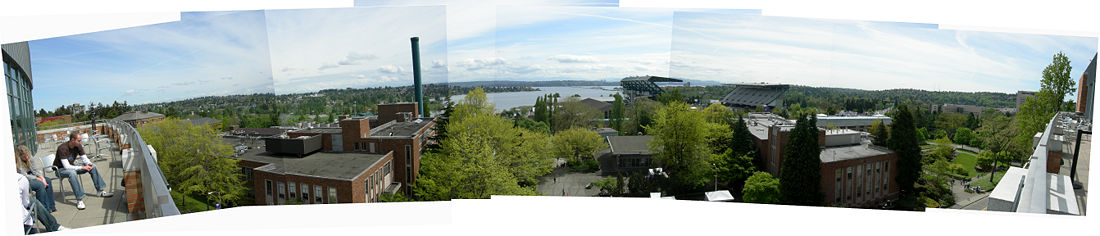 Panoramic view from the Alberg Terrace of the Allen Building (Computer Science & Engineering) looking East between the Mechanical Engineering building (left) and Civil Engineering building (right). Husky Stadium is in the distance to the right.