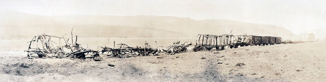 German ammunition train wrecked by shell fire, c. 1918.