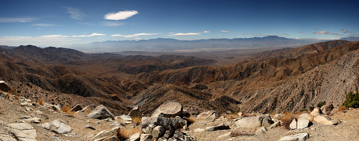 Panorama of the view south from Keys View in the Little San Bernardino Mountains, Joshua Tree National Park, California, USA. Visible landmarks are the Salton Sea (230ft below sea level) at rear left, along towards the center the Santa Rosa Mountains behind Indio and the San Jacinto Mountains behind Palm Springs. In the valley floor, the San Andreas Fault is clearly visible. At the rear right is the 11,500ft San Gorgonio Mountain