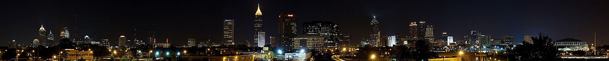 Panoramic view of the central Atlanta skyline, spanning Midtown (left) and Downtown (right).