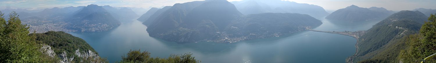 View of Lake Lugano from Monte San Salvatore, with Lugano to the left and the dam of Melide to the right