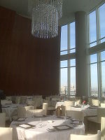 View of main dining room and its chandelier.