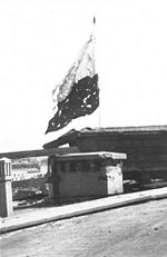 A frayed Polish flag during the final days of the Warsaw Uprising of 1944