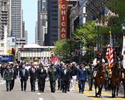 Casey, Daley, and other officials walk during the State Street parade.