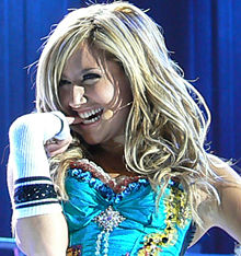 Tisdale performing her debut single "Be Good to Me" in the tour High School Musical: The Concert