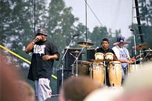 From left to right: Sen Dog, Eric Bobo and B-Real on stage during 2006 Bonnaroo Music Festival.