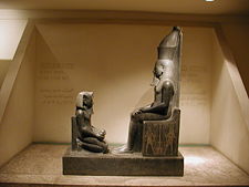 Statue of Horemheb giving offerings to Atum, at the Luxor Museum